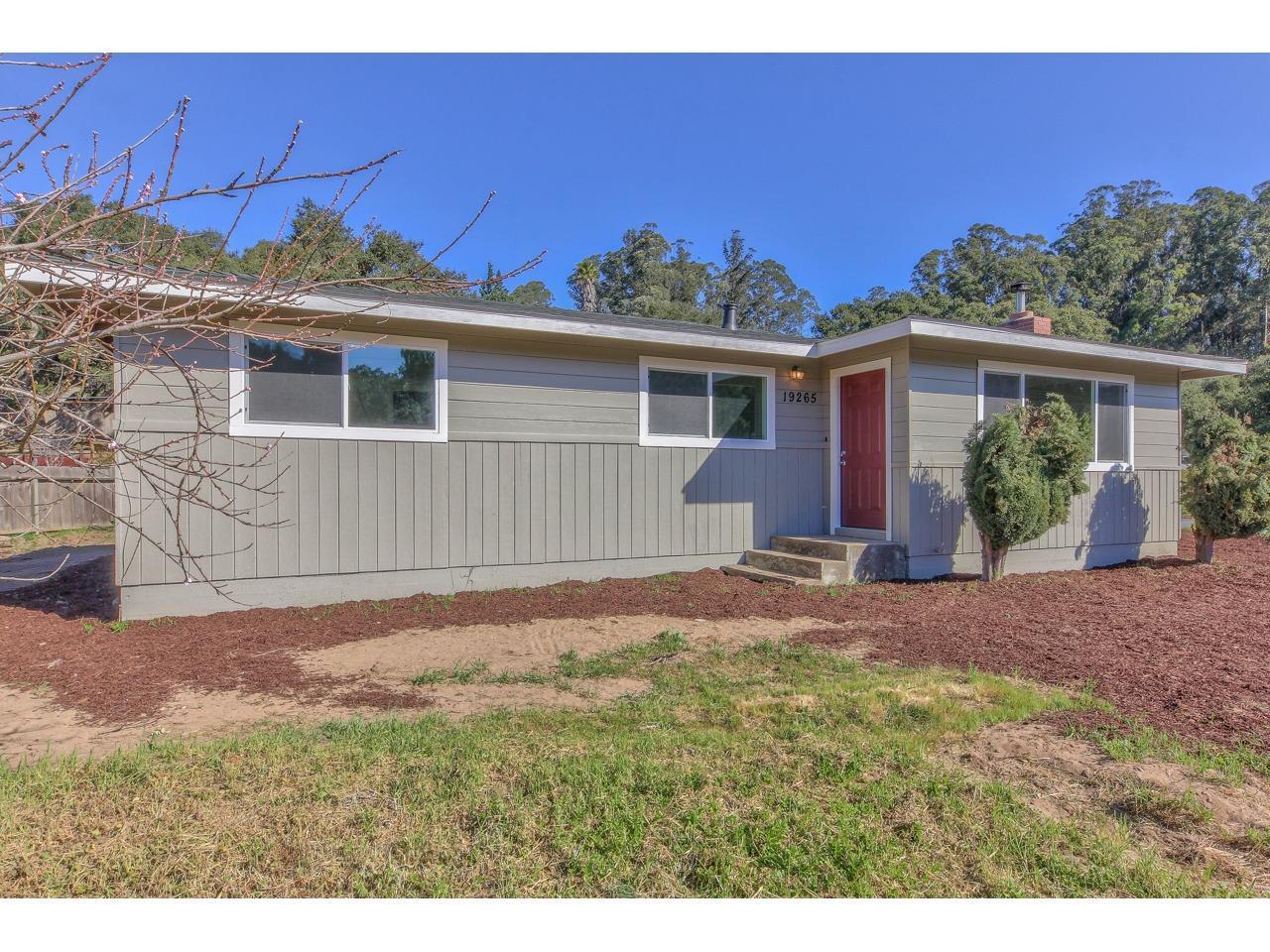 19265 Mallory Canyon Road Salinas, CA 93907 - Photo 2 of 17 a view of a yard in front of a house with plants