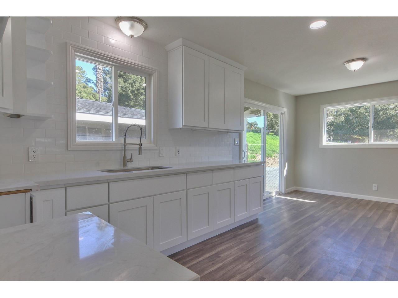 19265 Mallory Canyon Road Salinas, CA 93907 - Photo 4 of 17 a kitchen with a sink cabinets and window