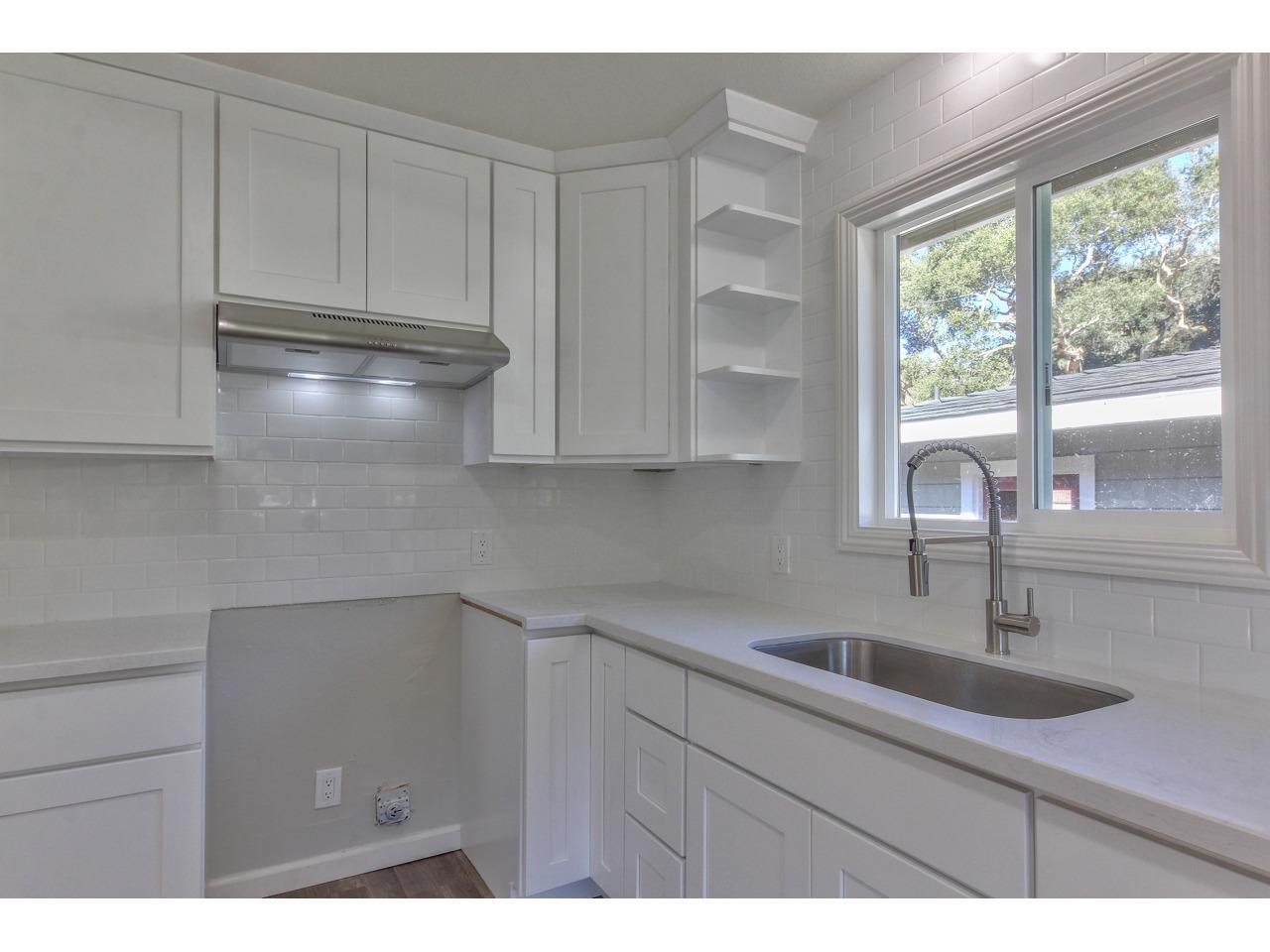 19265 Mallory Canyon Road Salinas, CA 93907 - Photo 5 of 17 a kitchen with a sink cabinets and window