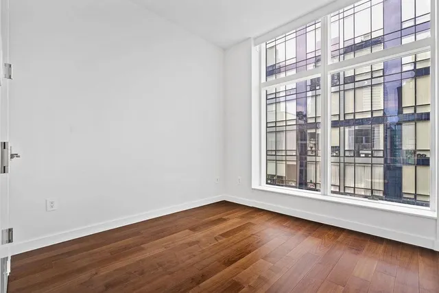 a view of tall buildings in the background