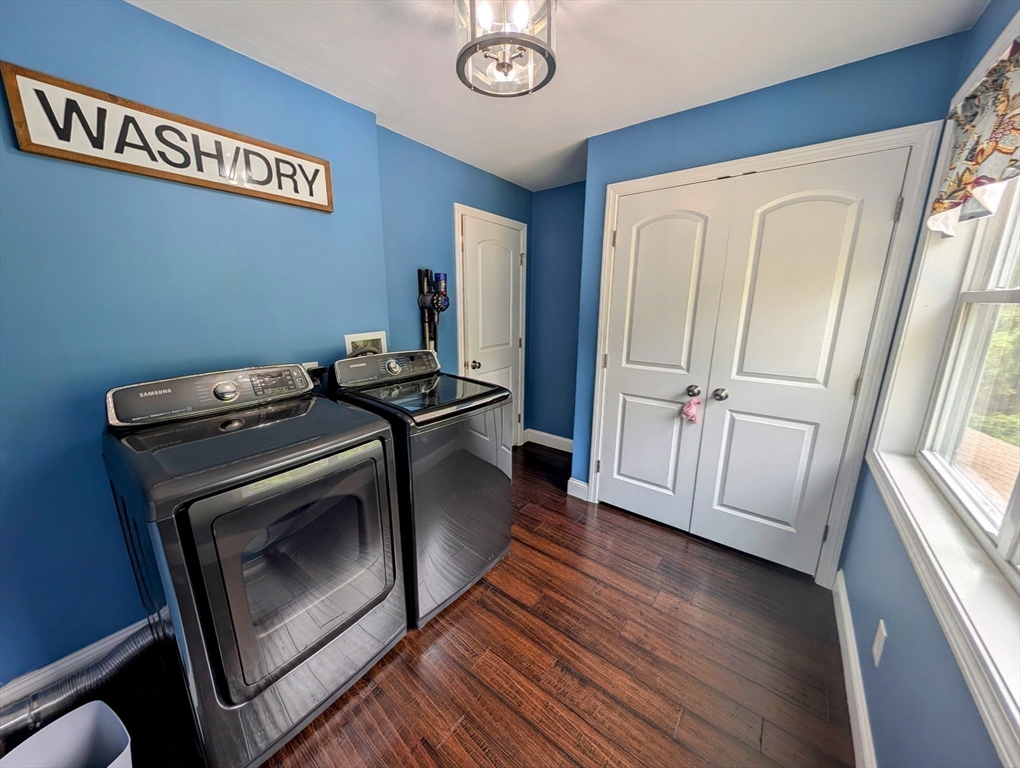 74 Baker Pond Road Dudley, MA 01571 - Photo 19 of 42 a view of a livingroom with wooden floor