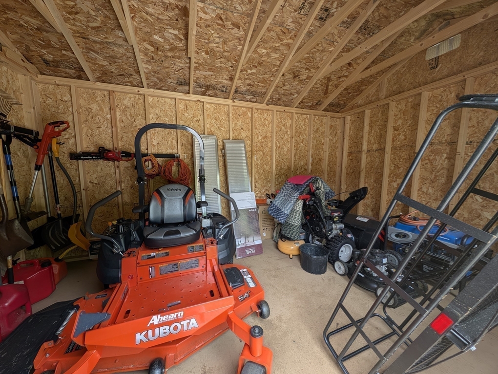 74 Baker Pond Road Dudley, MA 01571 - Photo 40 of 42 a view of a room with gym equipment