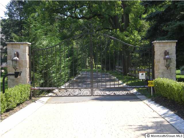 36 Laird Road Colts Neck, NJ 07722 - Photo 1 of 3 a view of a bench in a garden