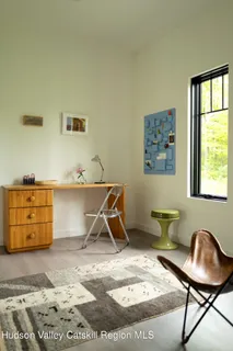 a room that has a couch and a chair in it