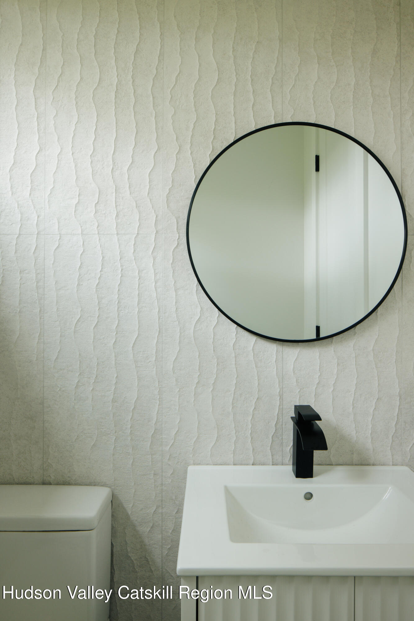 75 Cheviot Road Germantown, NY 12526 - Photo 19 of 30 a bathroom with a sink and mirror
