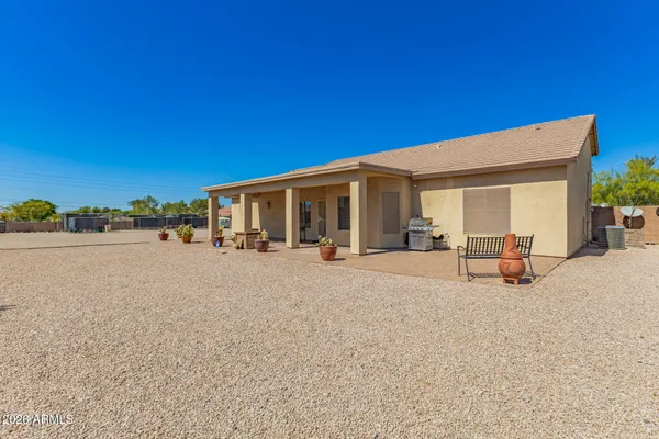 an aerial view of residential houses and outdoor space