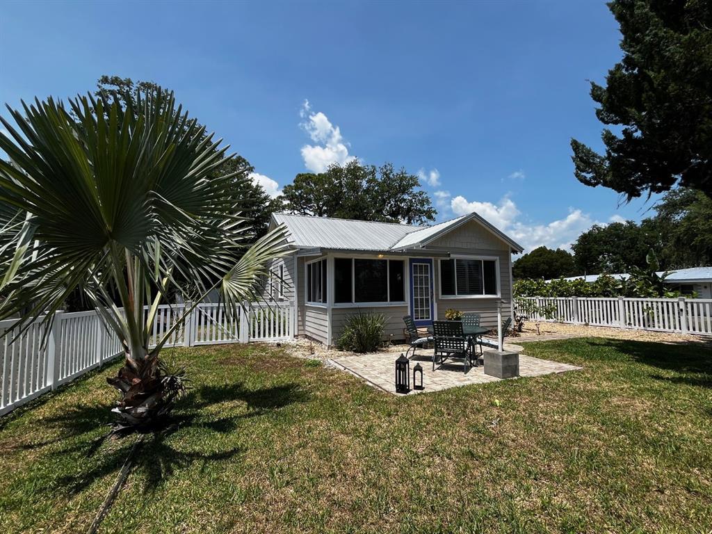 1300 South Riverside Drive Edgewater, FL 32132 - Photo 1 of 1 Front of home facing east towards the river with paver patio