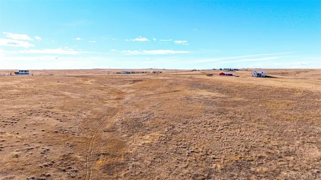 an aerial view of beach and ocean