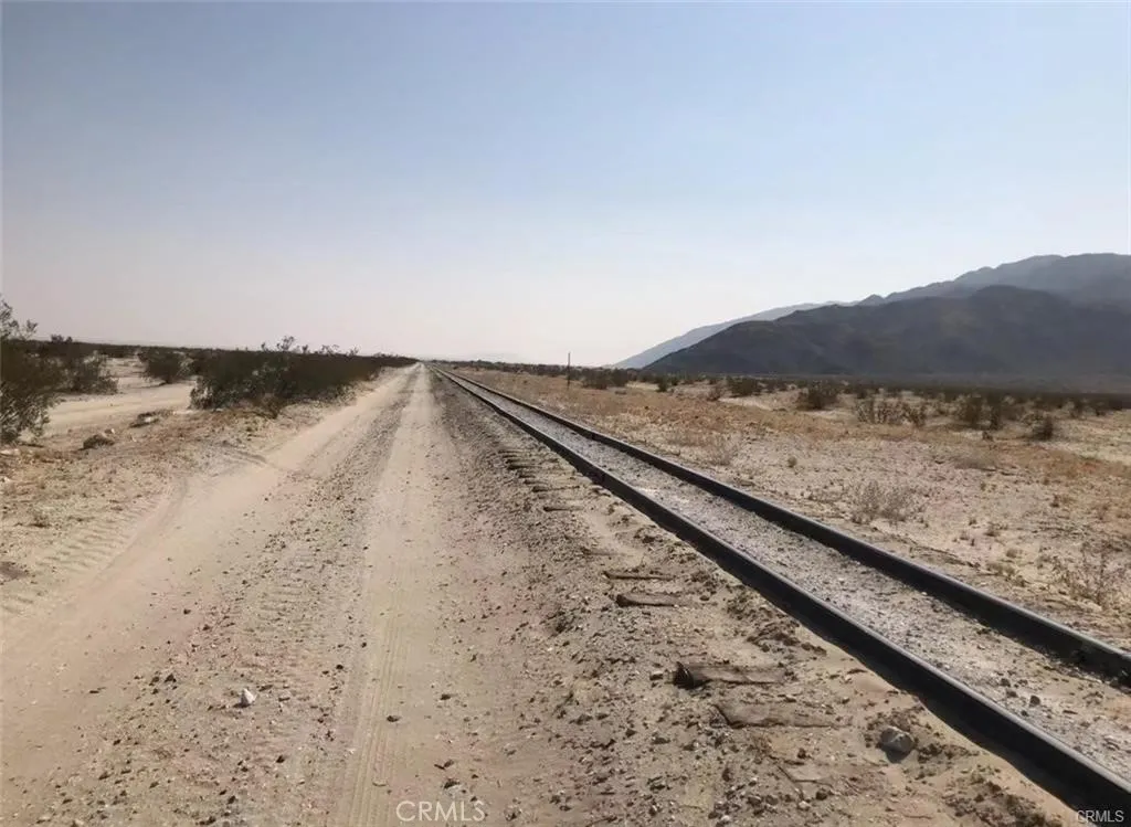 a view of ocean and mountain