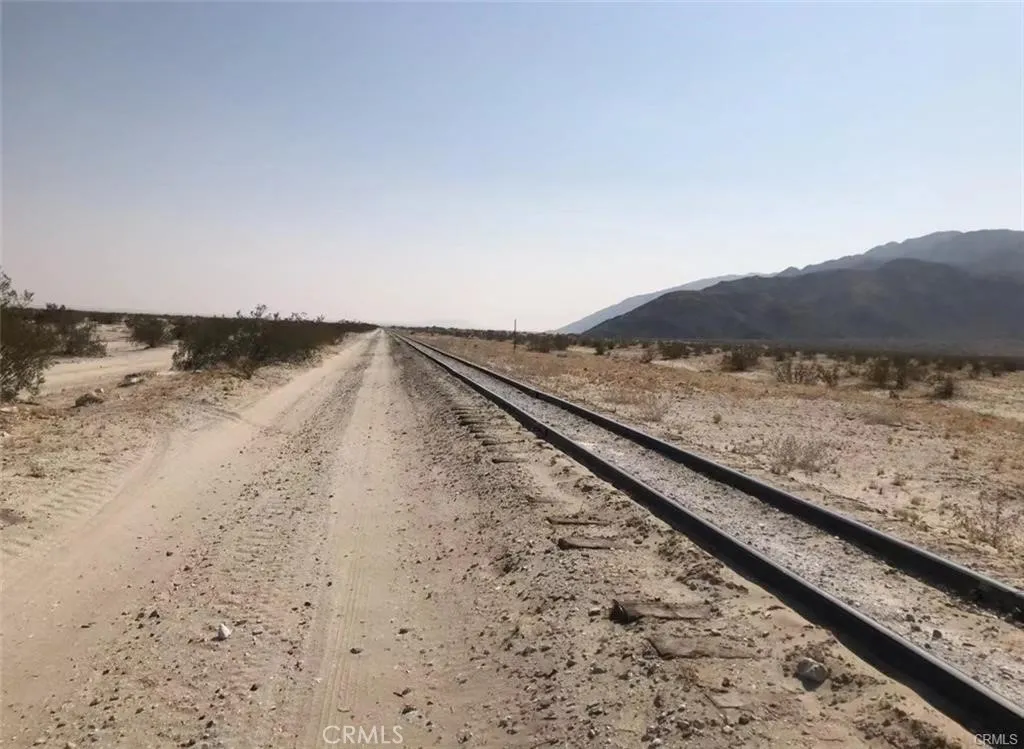 a view of ocean and mountain
