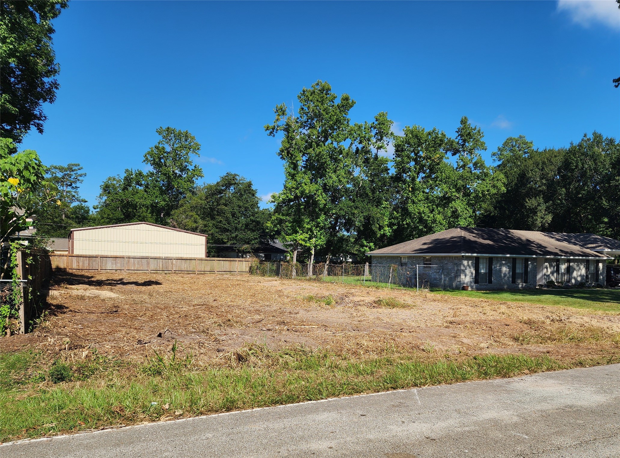 21809 Tophill Drive Spring, TX 77388 - Photo 46 of 50 This additional 1/4-acre lot offers room for a shop, workspace, business vehicles, equipment, or additional storage. With a desirable spot along the property street, this versatile lot provides plenty of possibilities for making the space work for you.