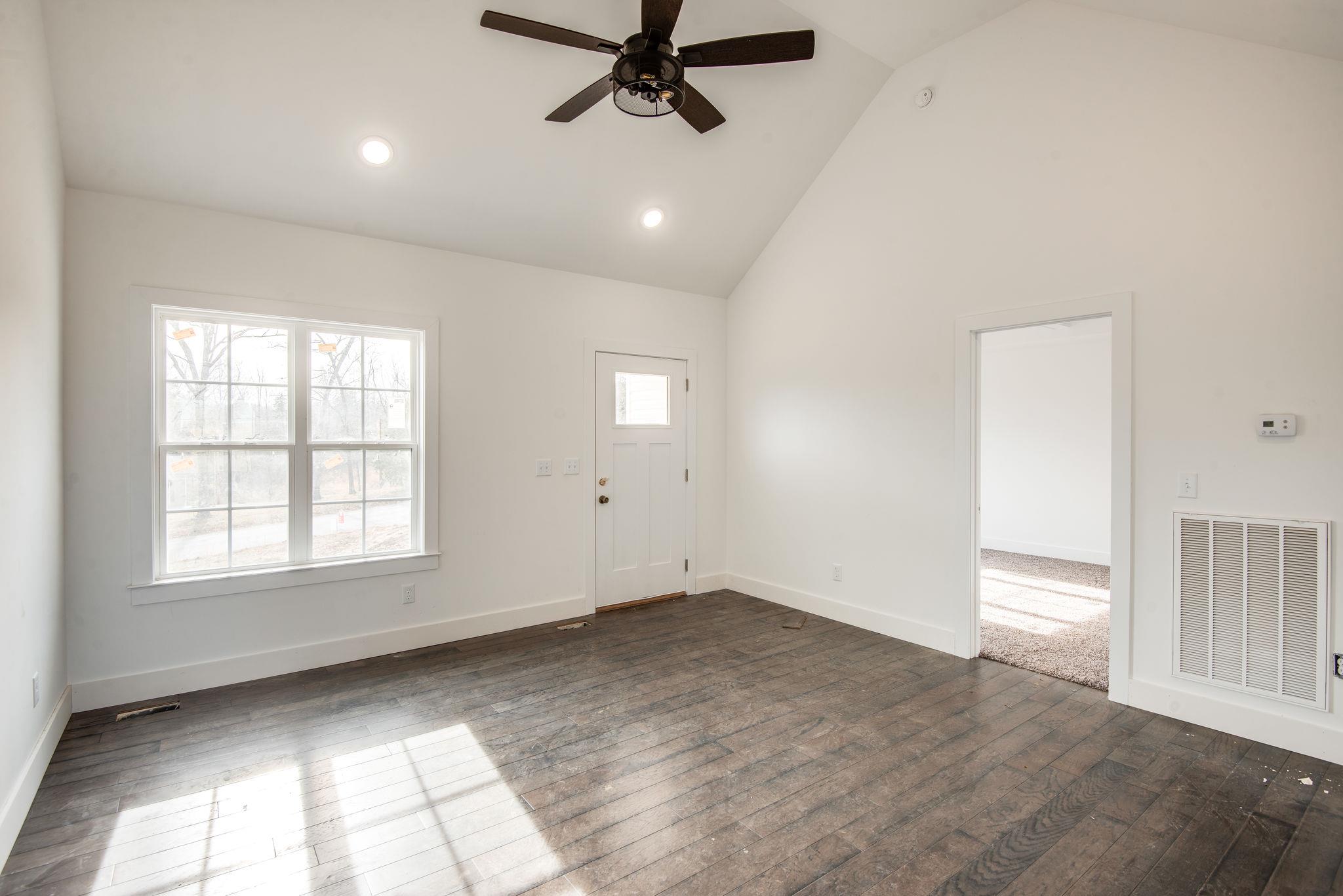 881 Hooper Road Charlotte, TN 37036 - Photo 4 of 24 Great Room w/ Upgraded Wide Plank Wood Floors