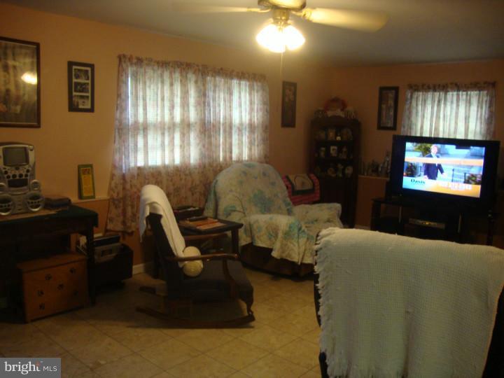 1610 Nathaniel Mitchell Road Dover, DE 19904 - Photo 7 of 12 Family Room