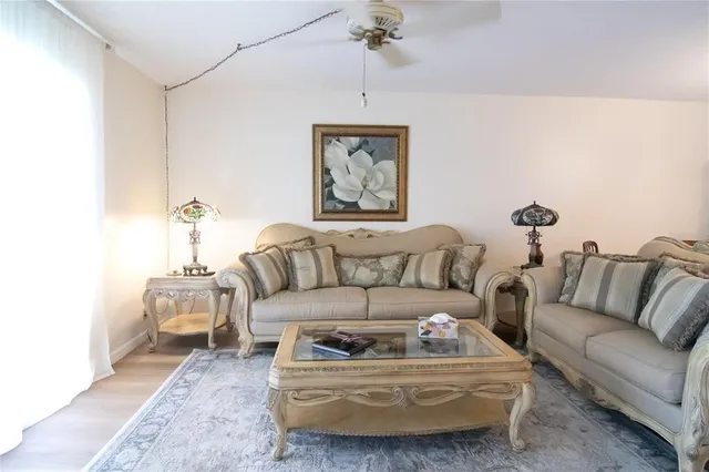 a living room with furniture and a couch