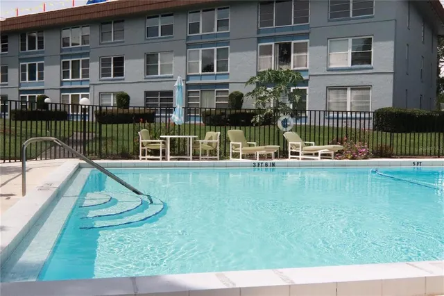 a view of a house with a swimming pool