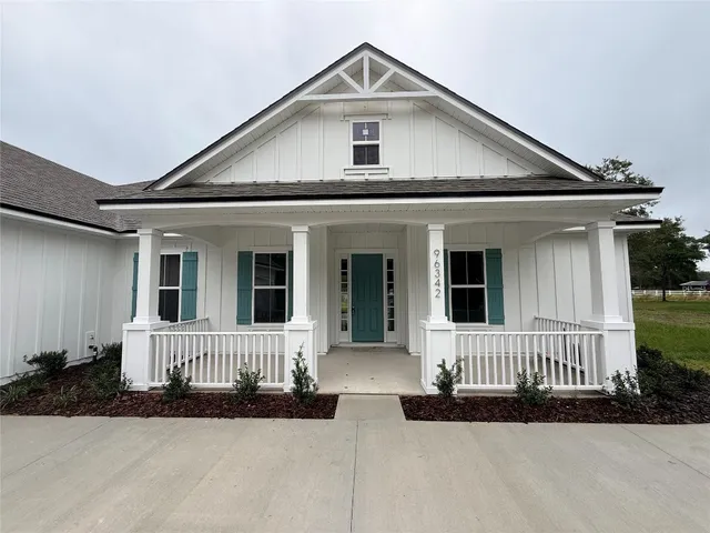 a front view of a house with a porch