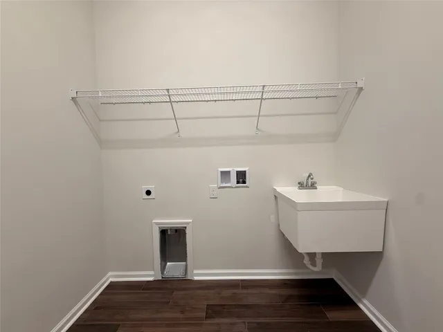 a bathroom with a sink and mirror