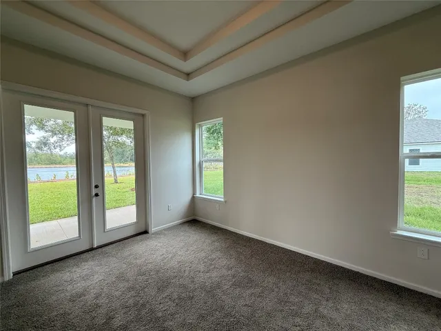 an empty room with windows