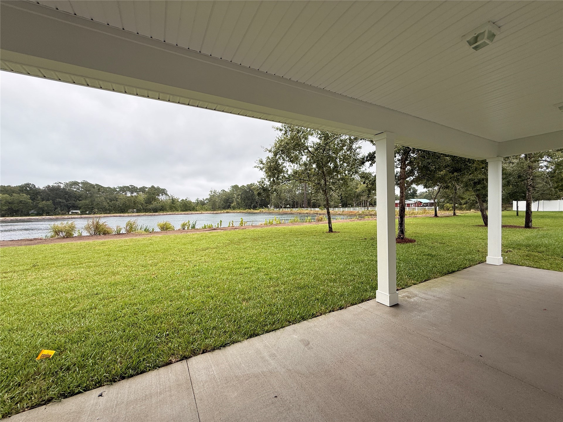 96342 Blackrock Road Yulee, FL 32097 - Photo 23 of 23 a view of a lake with a big yard