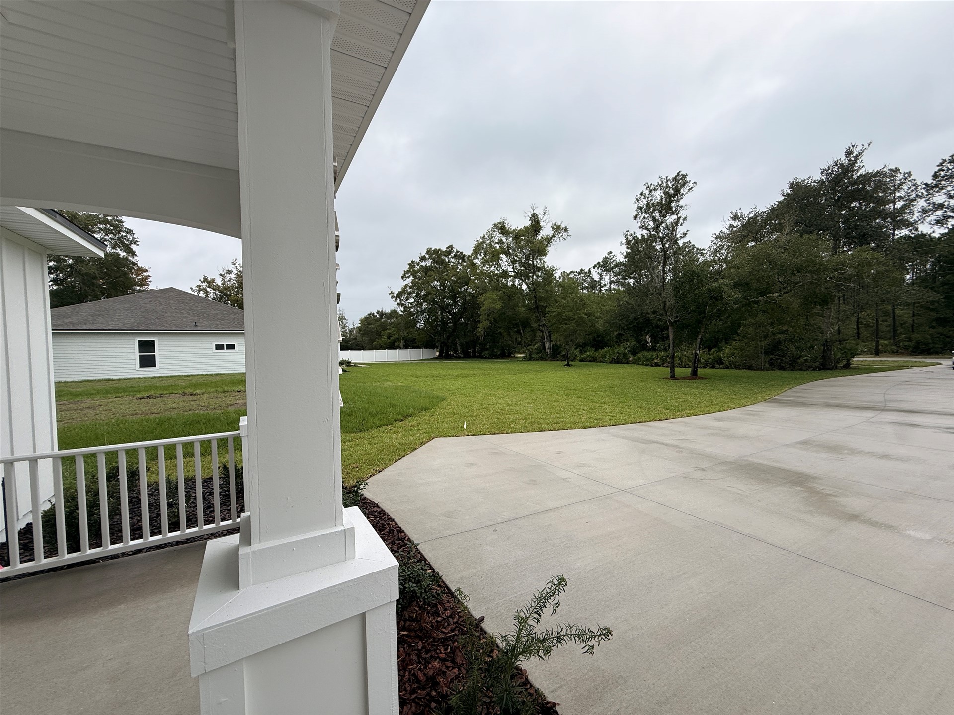 96342 Blackrock Road Yulee, FL 32097 - Photo 5 of 23 a view of a patio with a yard