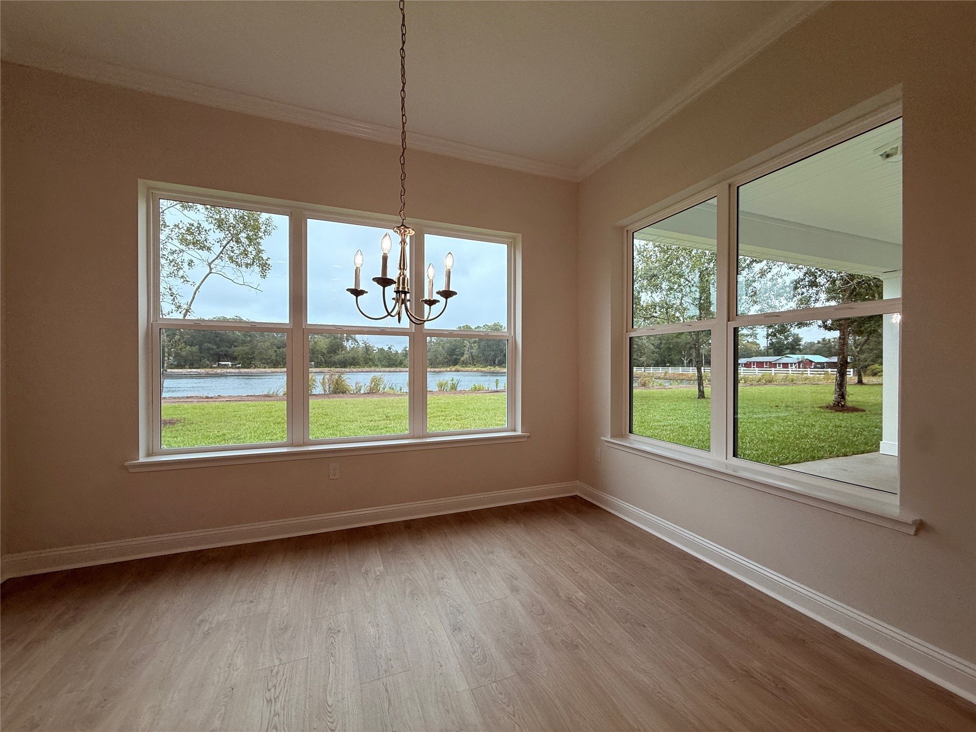96342 Blackrock Road Yulee, FL 32097 - Photo 10 of 23 a view of room with window and hardwood floor