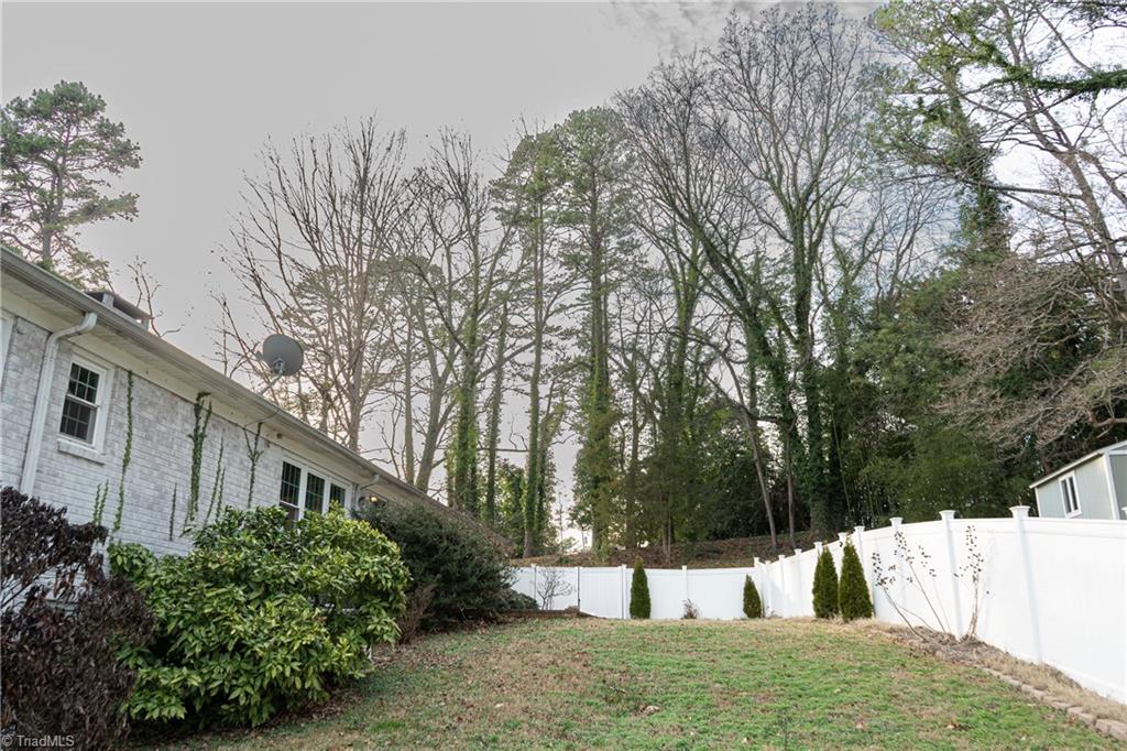 201 Partridge Lane Lexington, NC 27292 - Photo 21 of 40 Spacious Back yard, fully fenced with multiple gates