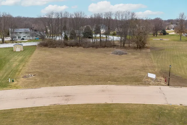 a view of swimming pool and lake in back