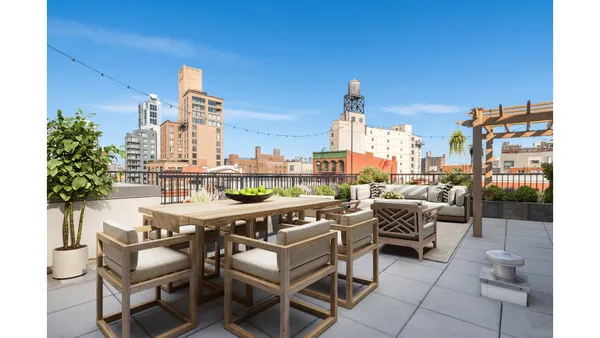 a view of a terrace with furniture and outdoor view