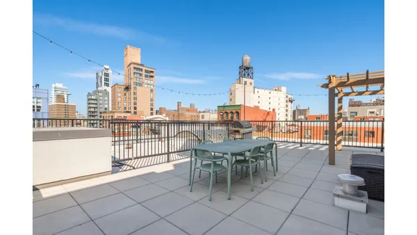 a view of a terrace with chairs