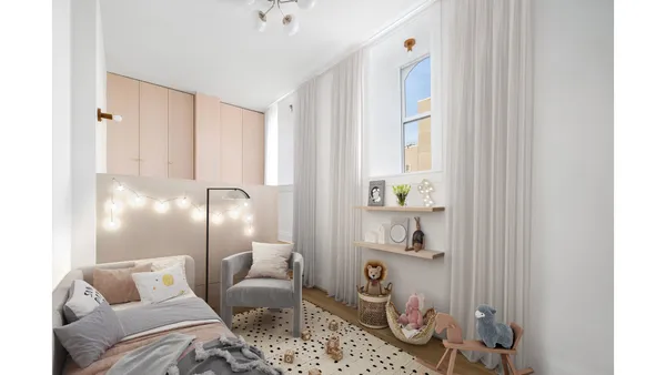 a bedroom with furniture and a window