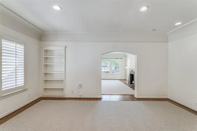 an empty room with windows