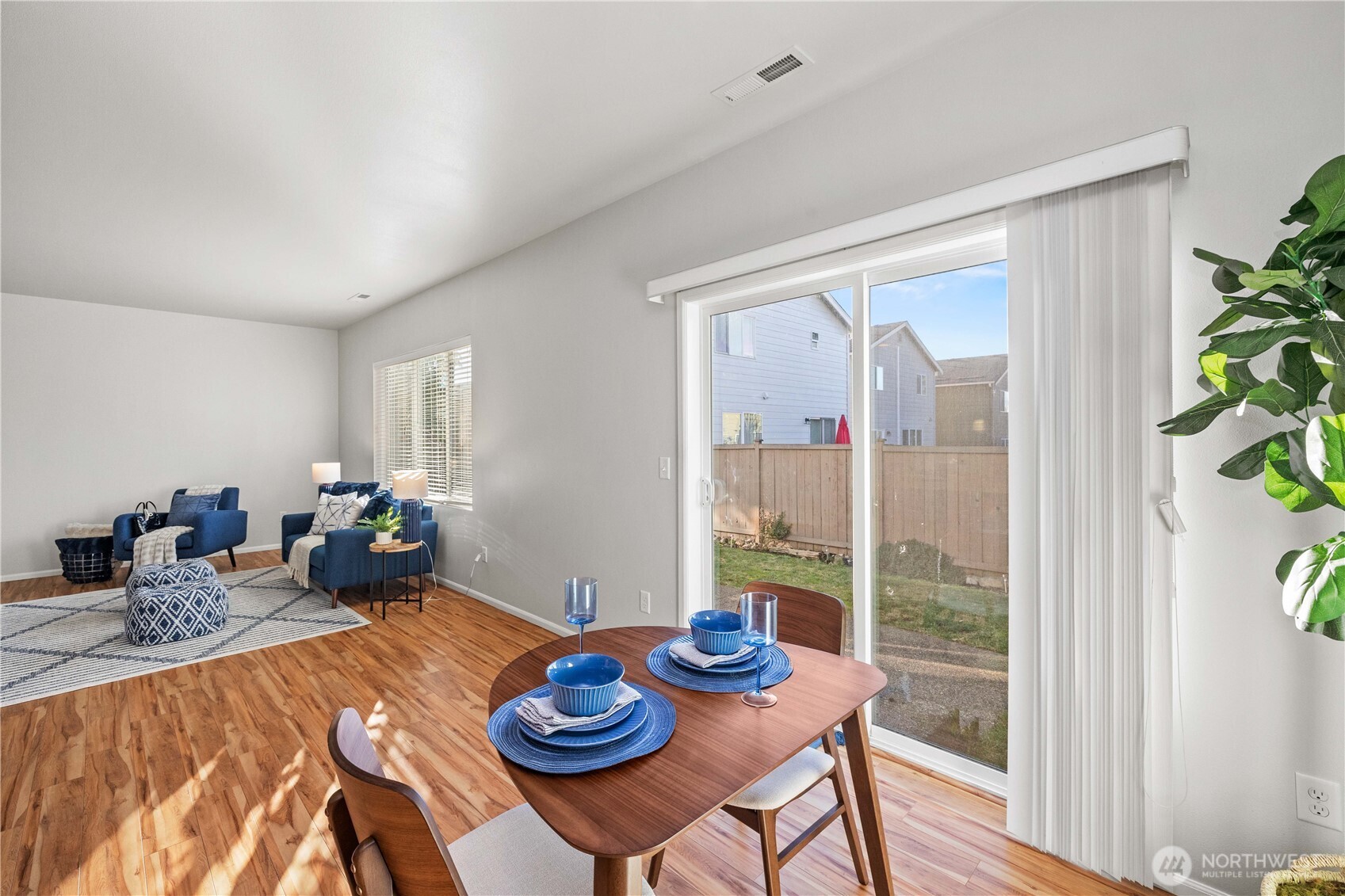 26219 243rd Place Southeast Maple Valley, WA 98038 - Photo 13 of 40 a bed room with furniture and a potted plant