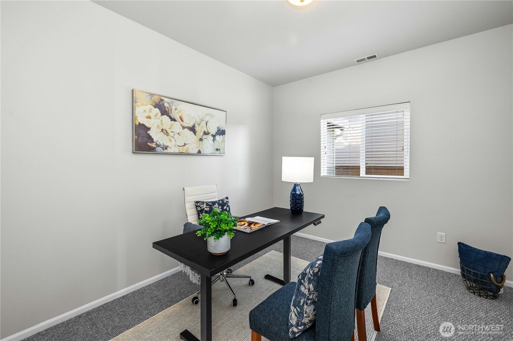 26219 243rd Place Southeast Maple Valley, WA 98038 - Photo 15 of 40 a view of a workspace room with furniture and wooden floor