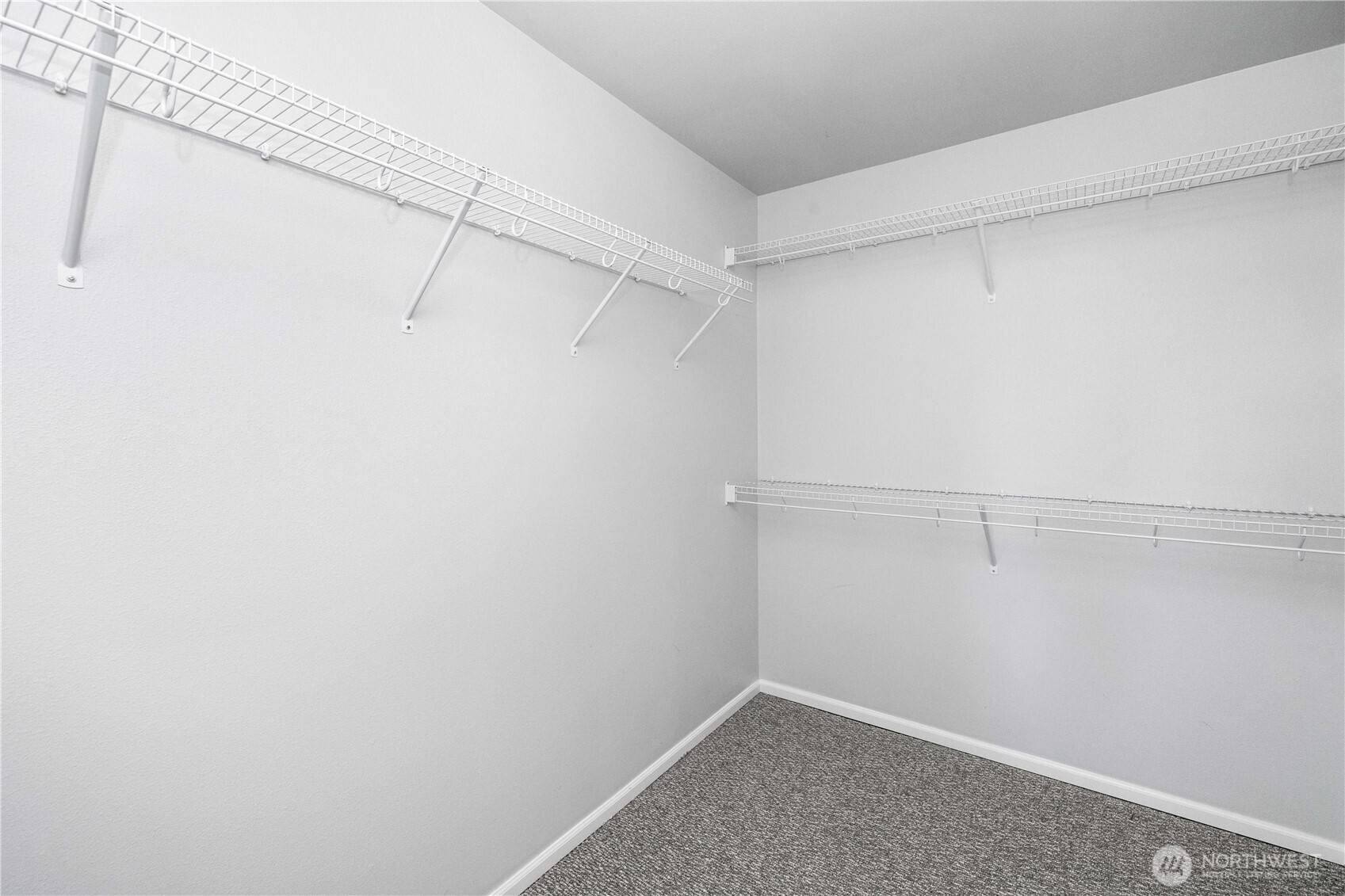 26219 243rd Place Southeast Maple Valley, WA 98038 - Photo 23 of 40 a view of a room with racks on the wall