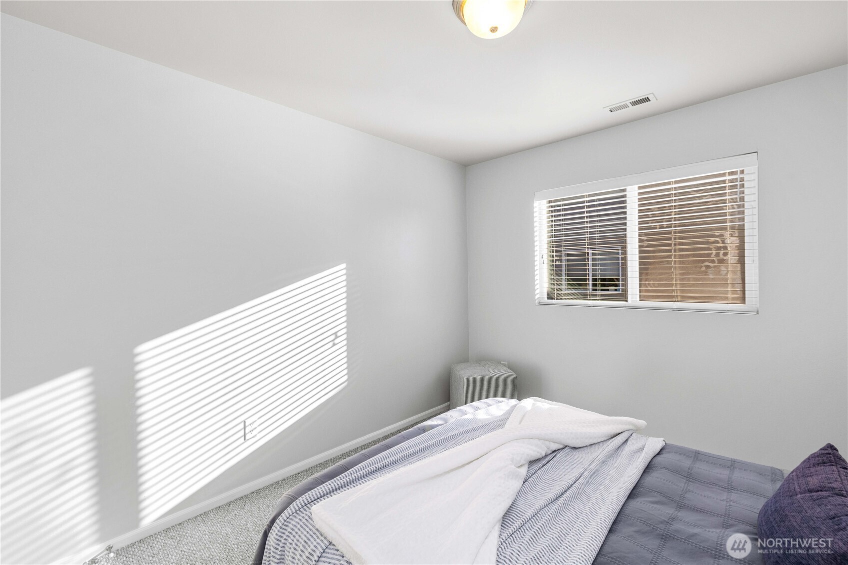 26219 243rd Place Southeast Maple Valley, WA 98038 - Photo 25 of 40 a bedroom with a bed and a window