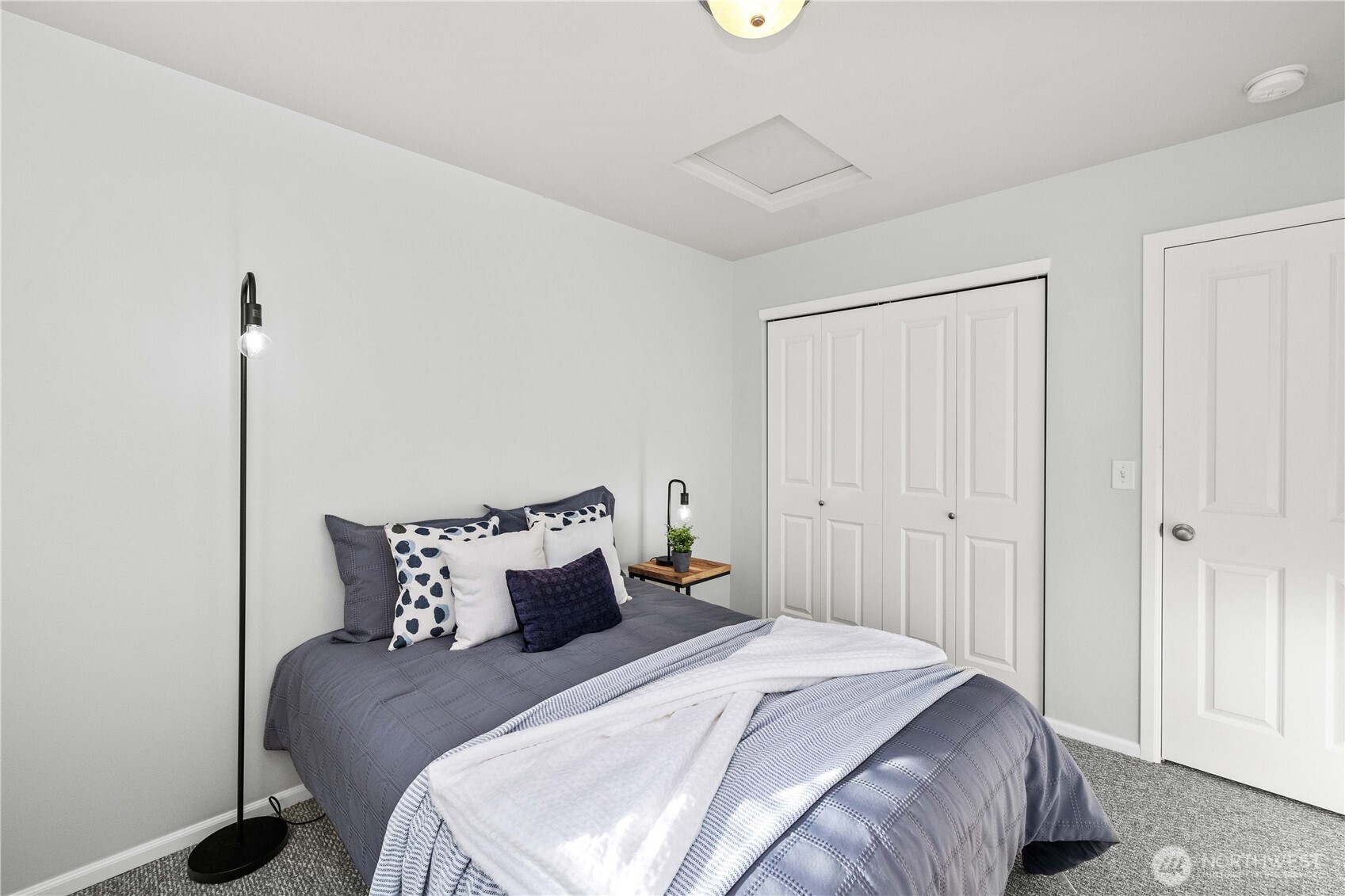 26219 243rd Place Southeast Maple Valley, WA 98038 - Photo 26 of 40 a bedroom with bed and window