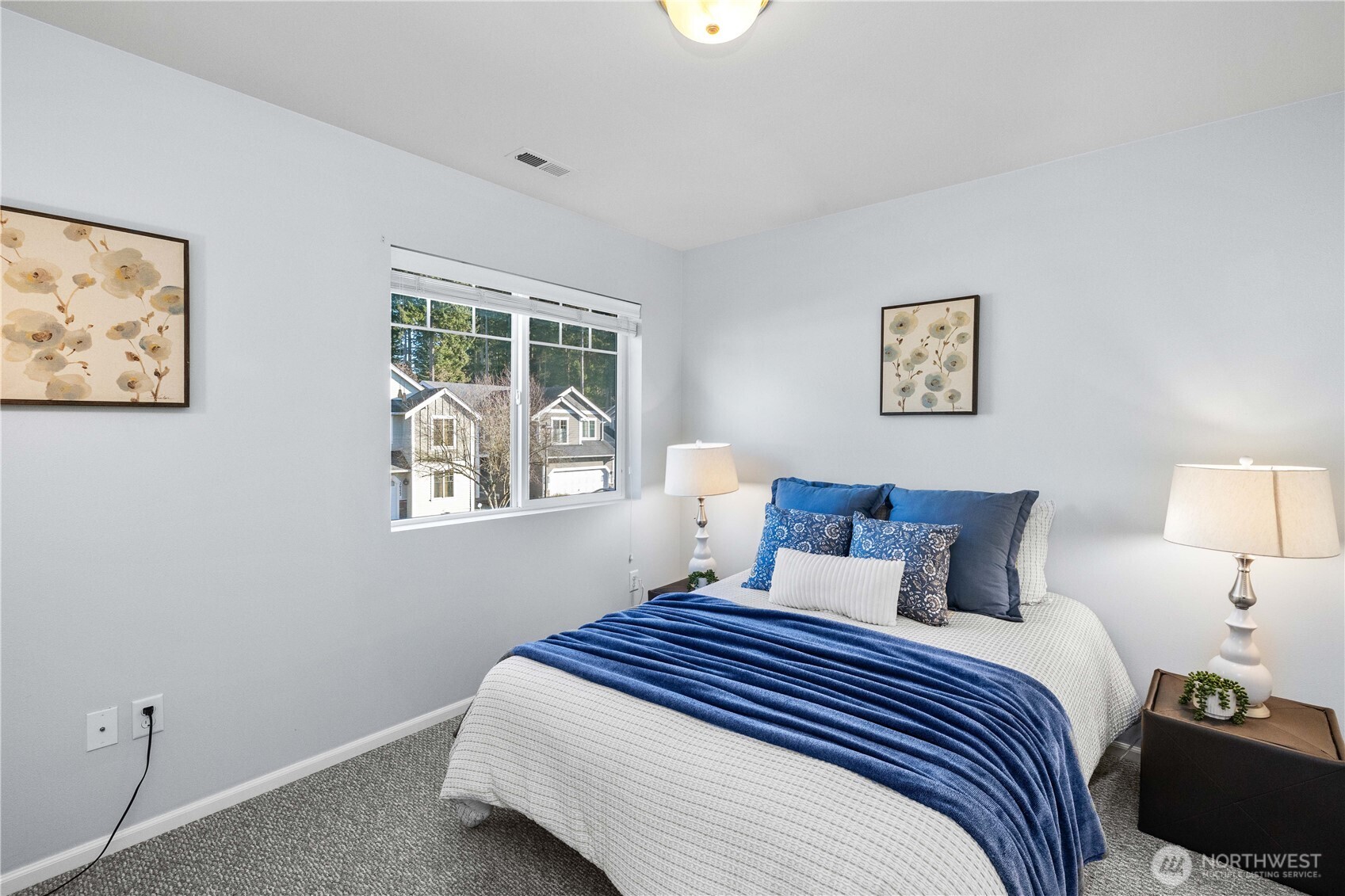 26219 243rd Place Southeast Maple Valley, WA 98038 - Photo 32 of 40 a bedroom with a bed and a window