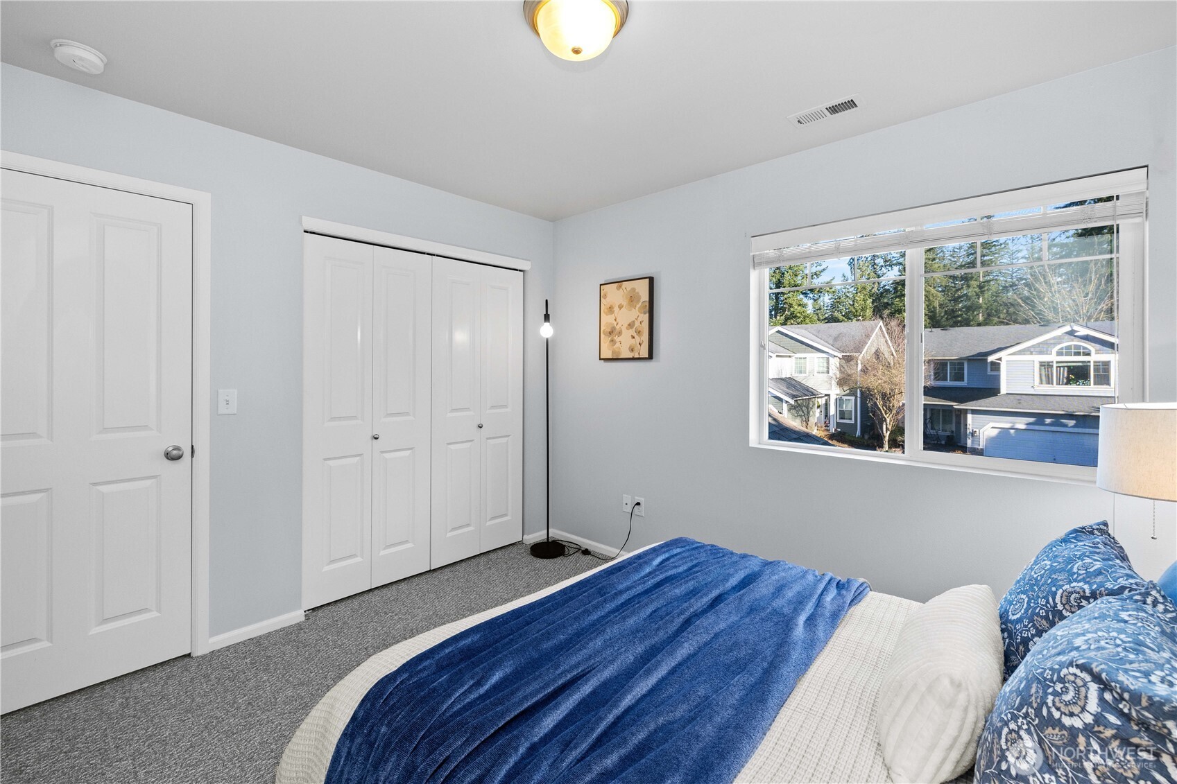 26219 243rd Place Southeast Maple Valley, WA 98038 - Photo 33 of 40 a bedroom with a bed and a window