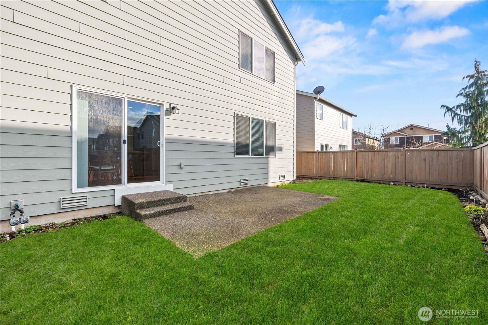 26219 243rd Place Southeast Maple Valley, WA 98038 - Photo 35 of 40 a view of a backyard with a garden