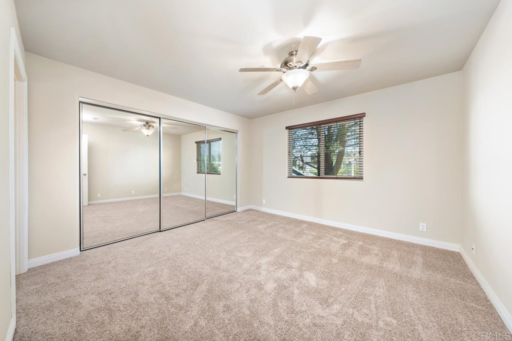 1434 Marshall Road, Unit 26 Alpine, CA 91901 - Photo 10 of 13 a view of an empty room with a window