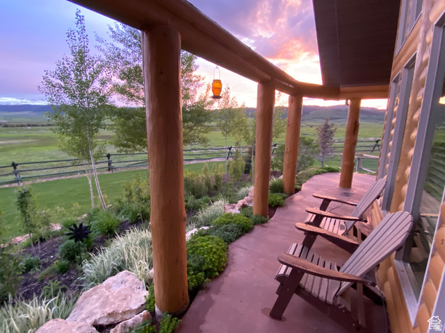 79 Auburn Forest Road Auburn, WY 83111 - Photo 13 of 76 View of patio terrace at dusk