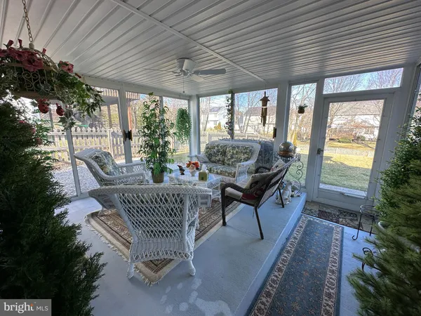 a outdoor living space with furniture and garden view