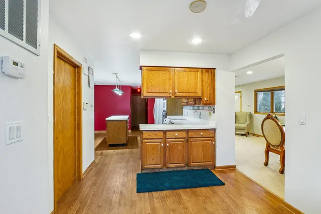 a very nice looking kitchen with a large window
