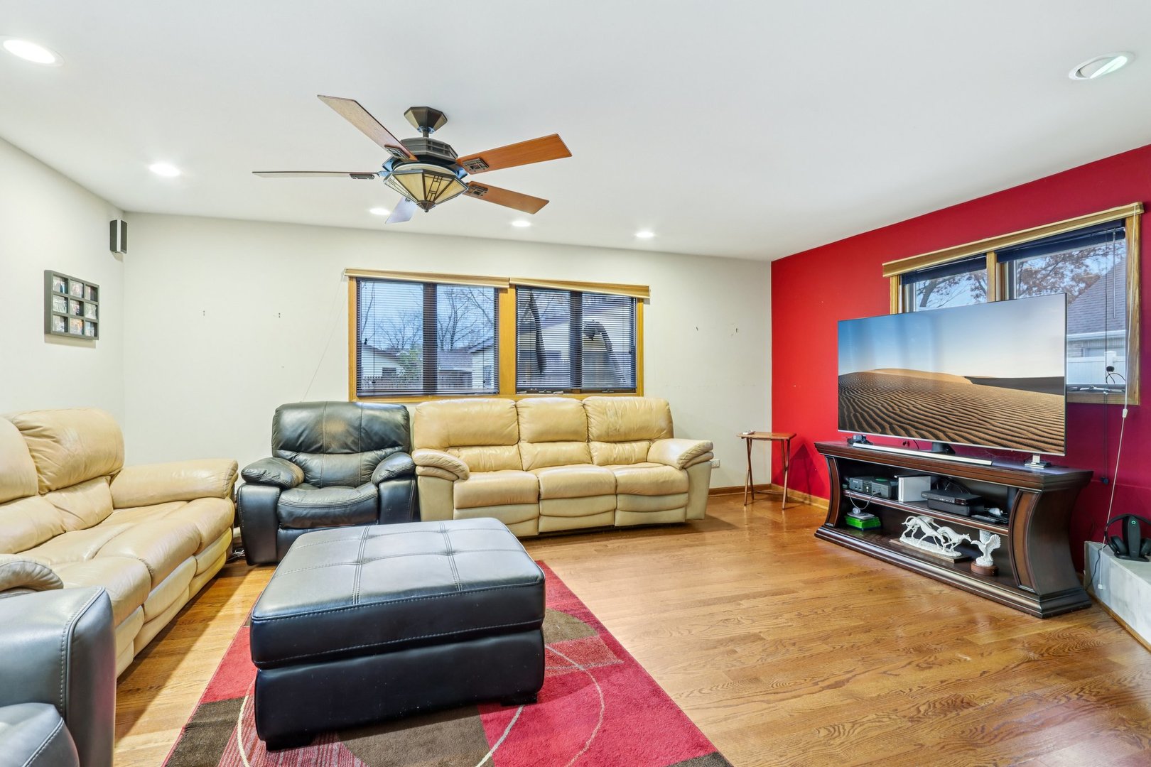 132 Tanglewood Drive Elk Grove Village, IL 60007 - Photo 2 of 42 a living room with furniture and a flat screen tv