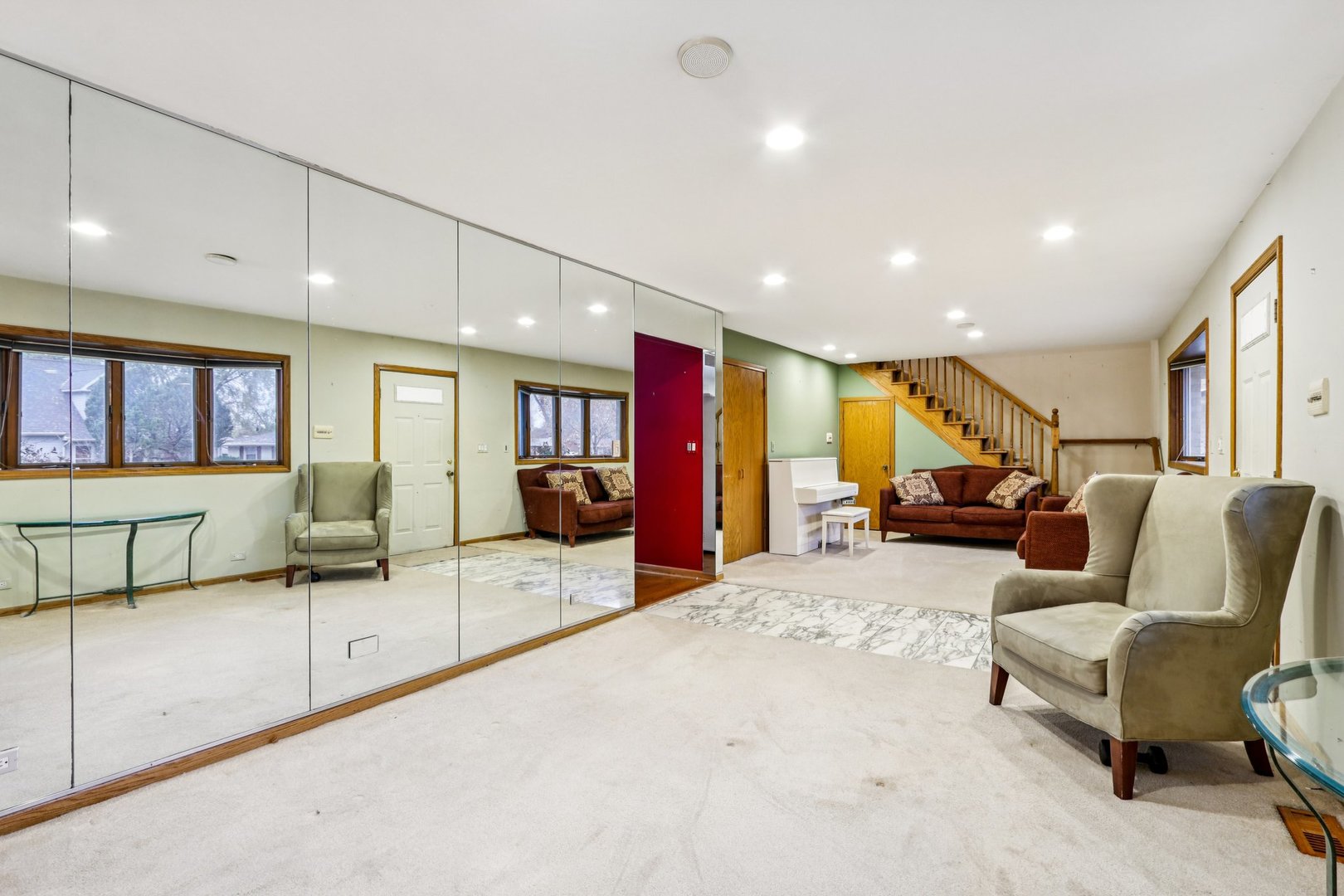 132 Tanglewood Drive Elk Grove Village, IL 60007 - Photo 7 of 42 a living room with furniture and a large window