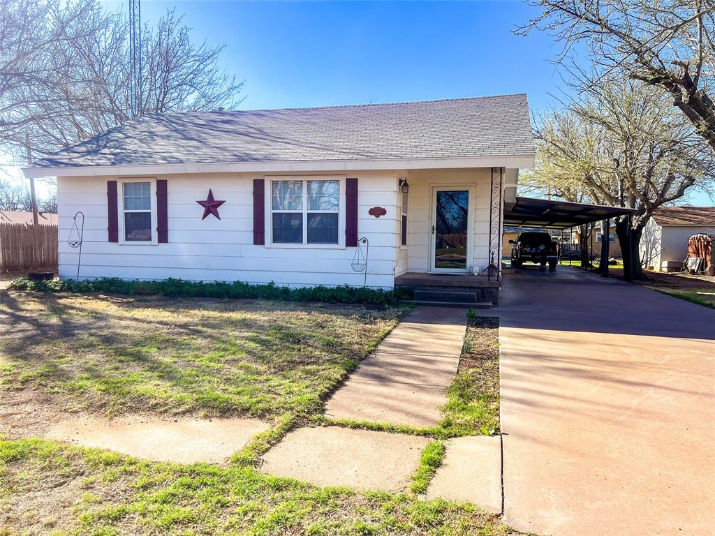 805 North 11th Street Haskell, TX 79521 - Photo 22 of 30 a view of a house with a swimming pool