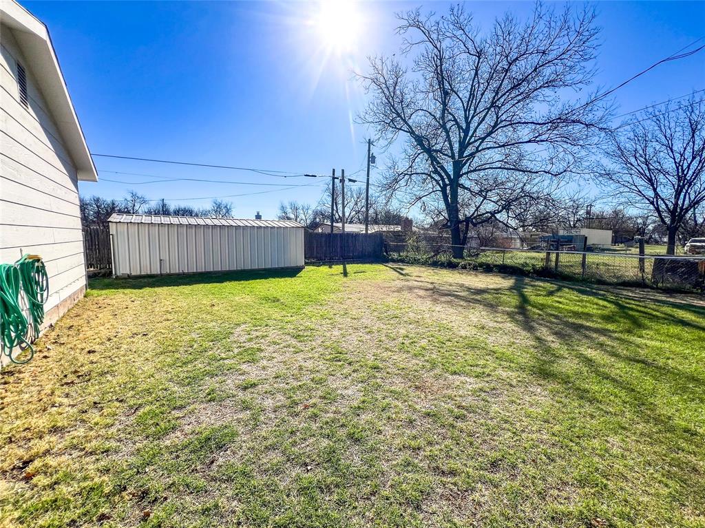 805 North 11th Street Haskell, TX 79521 - Photo 28 of 30 a view of a house with swimming pool and sitting area