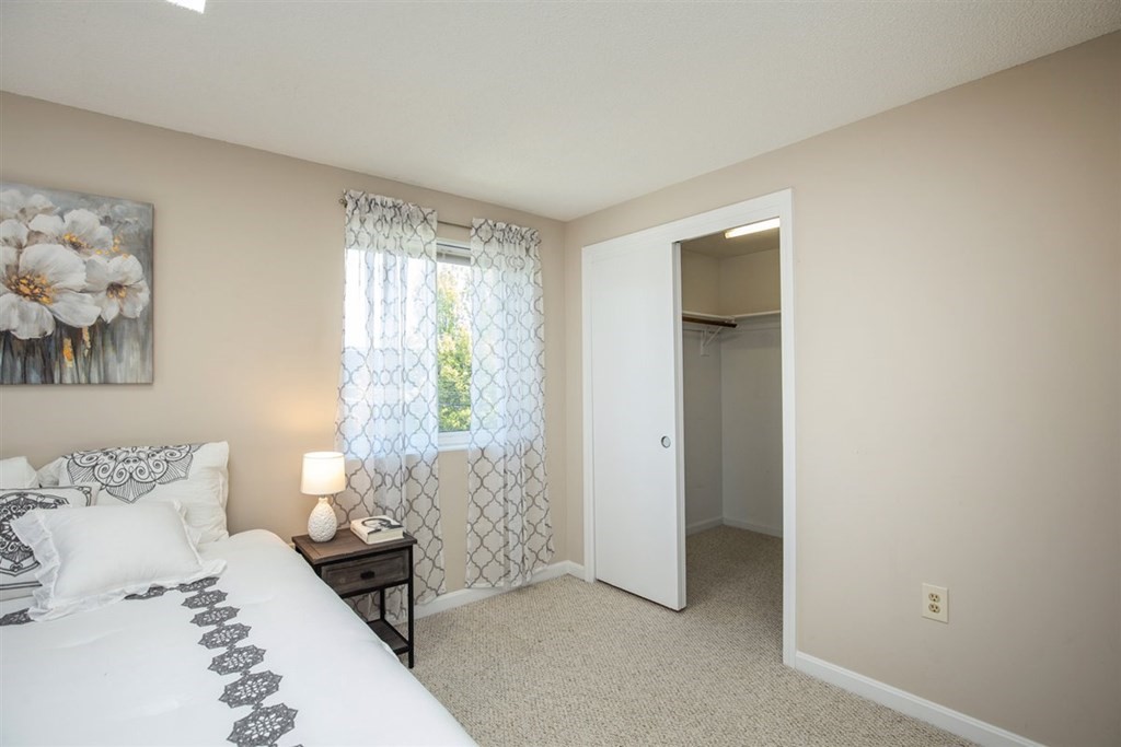 35 Prospect Street, Unit 301 Woburn, MA 01801 - Photo 14 of 19 a bedroom with a bed and a window