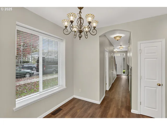 a view of a livingroom with a kitchen