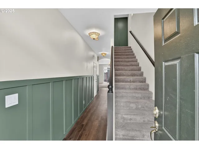 a view of entryway with stairs